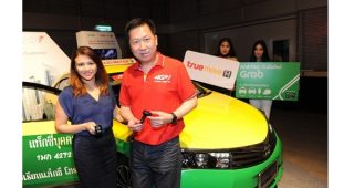 TrueMove H จับมือกับ Grab ยกระดับแท็กซี่ไทยสู่